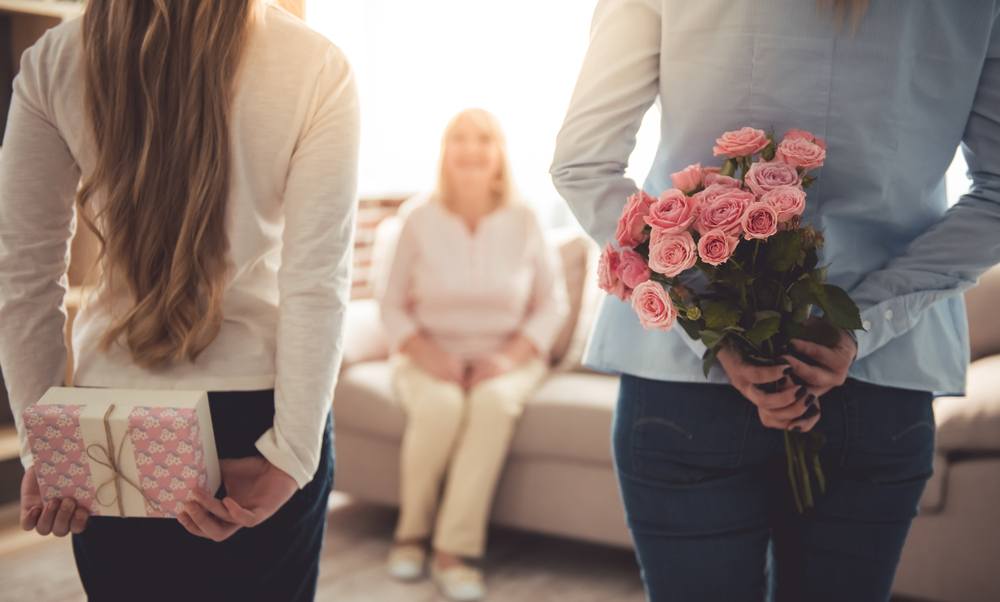 Brother and Sister surprising their mom